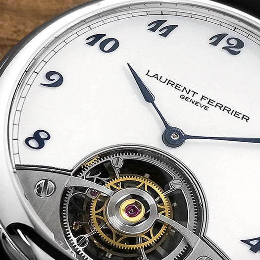 The Galet Classic Dual's grand feu enamel dial provides a contrasting backdrop for the navy-blue numerals and hands. The Galet Classic Dual's grand feu enamel dial provides a contrasting backdrop for the navy-blue numerals and hands.