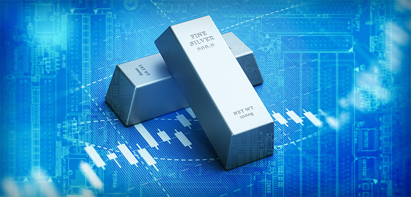 Three polished silver bars rest over a glowing digital market chart, symbolizing rising industrial demand, tightening supply, and silver’s growing role as a scarce hard asset amid inflation, market volatility, and increasing pressure on traditional retirement portfolios.