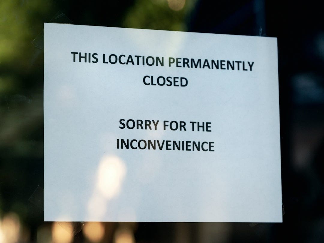 a close up of a sign on a glass door