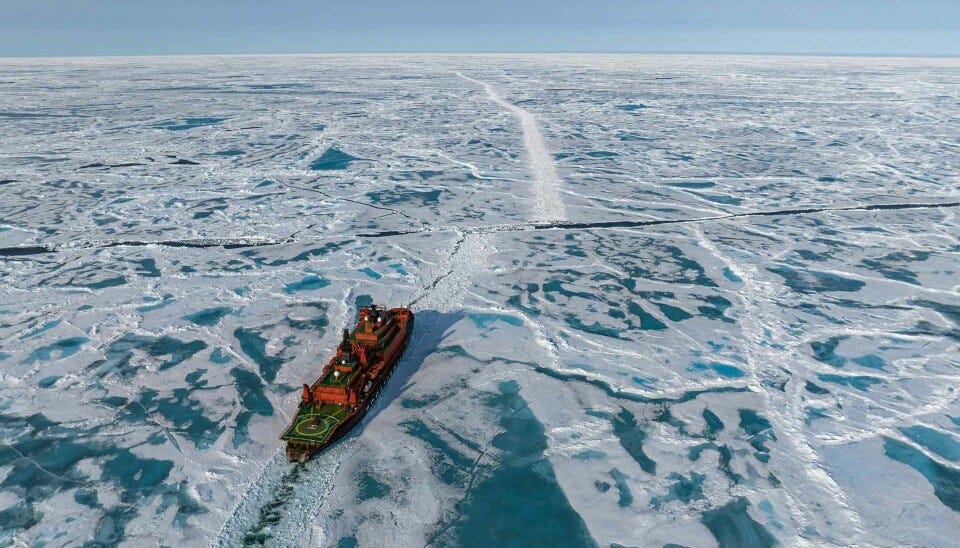 Nuclear-powered icebreaker Yamal makes way for this year's first convoy on Northern Sea Route.