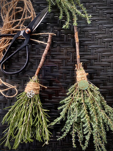 Brooms made with herbs and flowers. 