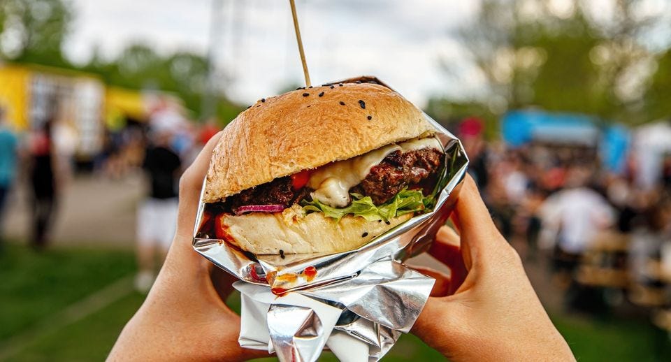 May be an image of 3 people, gyro, burger and souvlakia