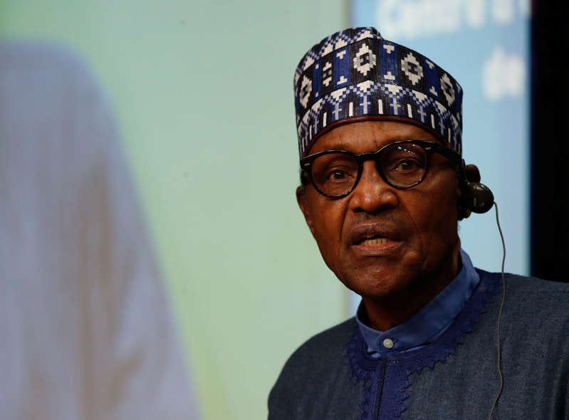 FILE - Nigeria's President Muhammadu Buhari gives a statement on the coronavirus disease (COVID-19) vaccination, during a European Union - African Union summit, in Brussels, Belgium February 18, 2022.