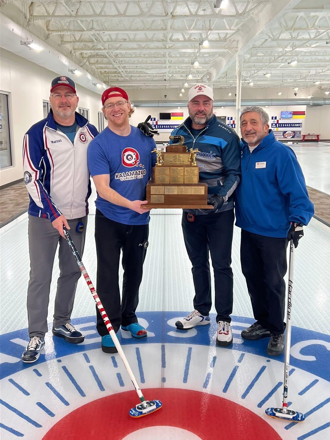 May be an image of hockey and text