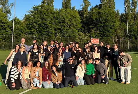 Graduates in front of an old chateau, five year high school reunion, five girls in Brussels
