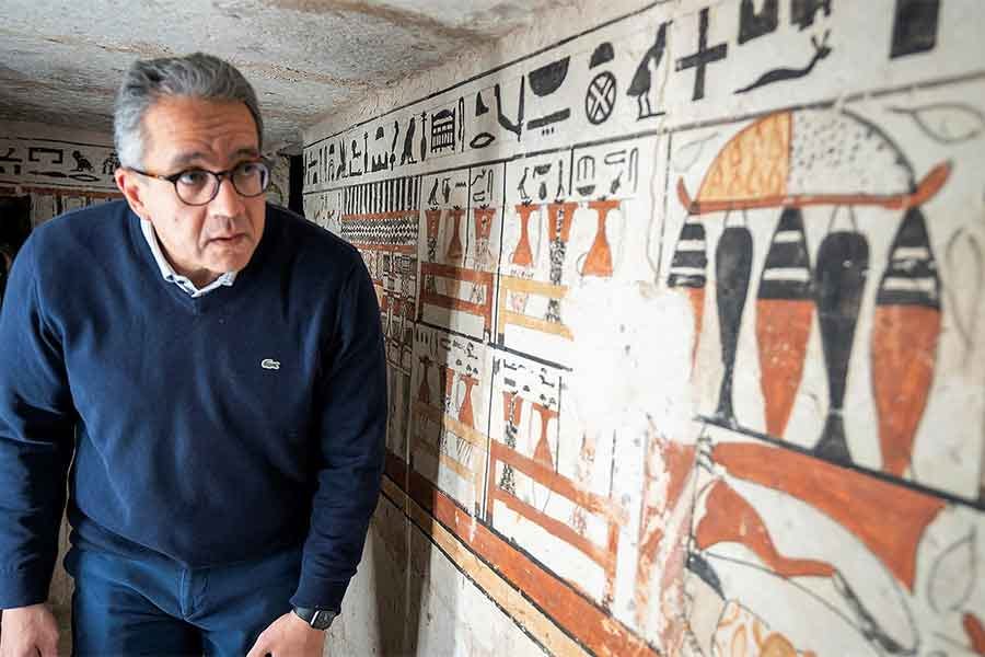 Minister of Tourism and Antiquities Khaled El-Enany before one of the new tomb’s wall scenes depicting a variety of offerings Minister of Tourism and Antiquities Khaled El-Enany before one of the new tomb’s wall scenes depicting a variety of offerings