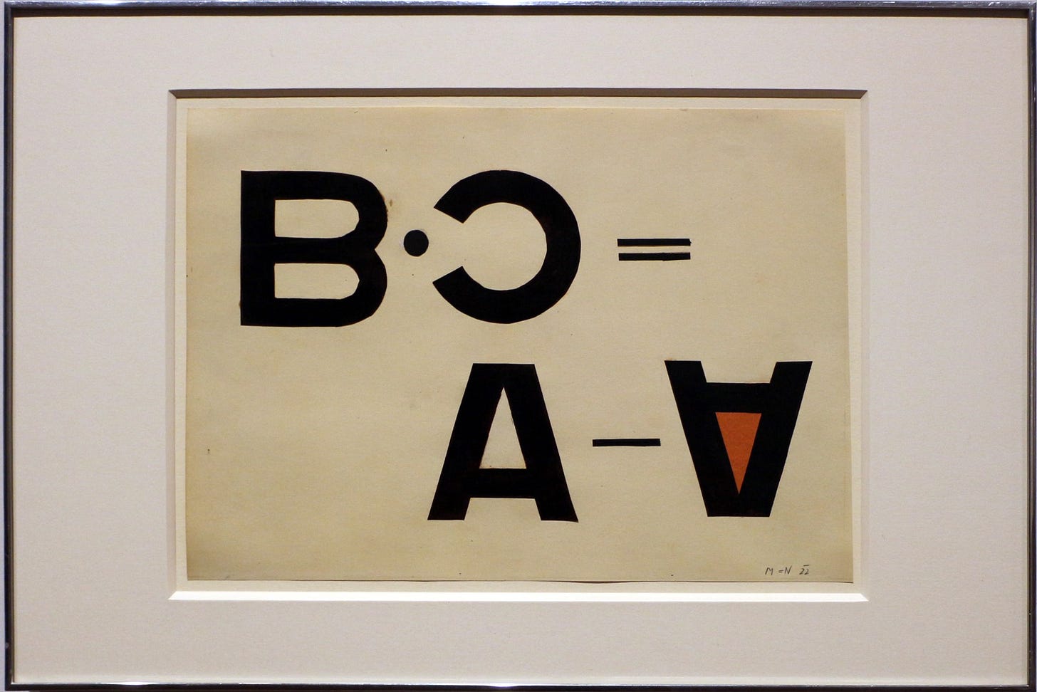 collage that has the letters B, C, A and A in various positions on brown paper collage that has the letters B, C, A and A in various positions on brown paper