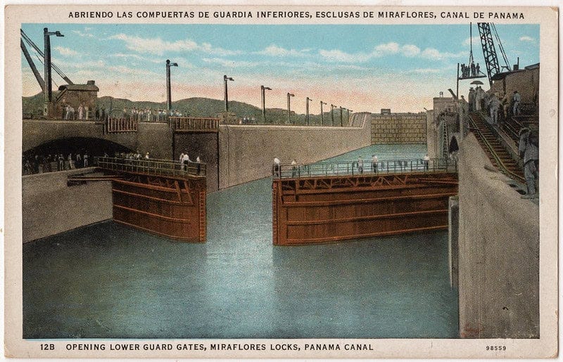 vintage postcard image of the Miraflores Locks slightly open at the Panama Canal