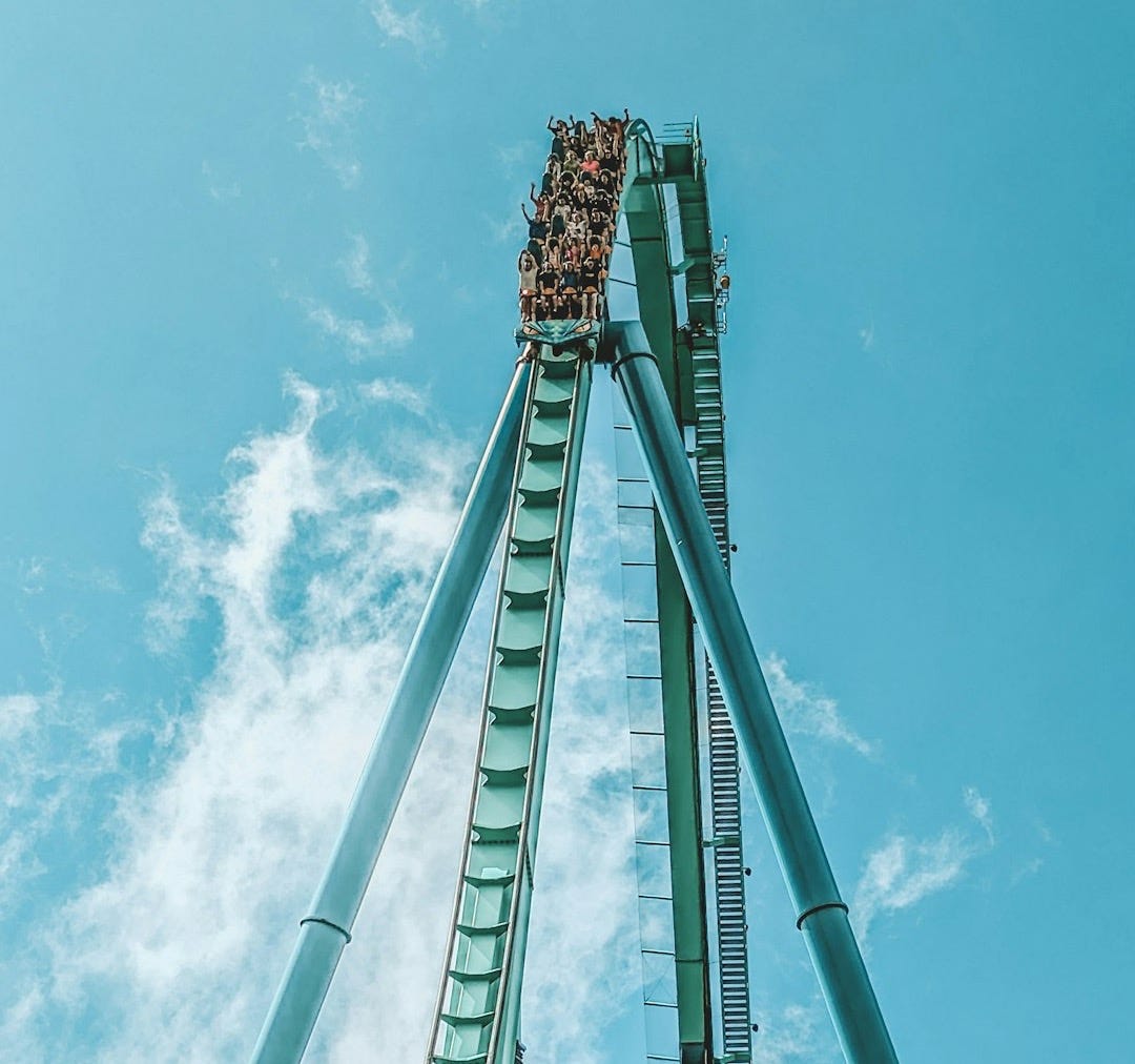a roller coaster going up in the air