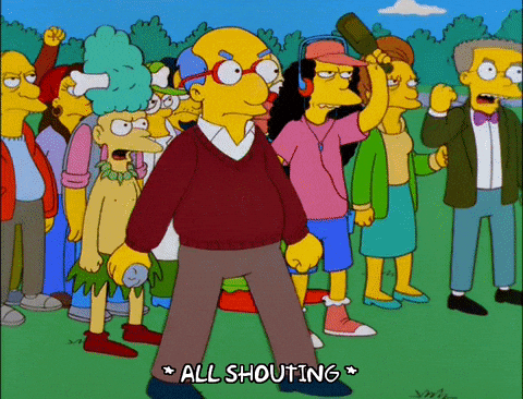 A gif from the Simpsons that shows a mob of seniors waving their hands angrily and throwing bottles.