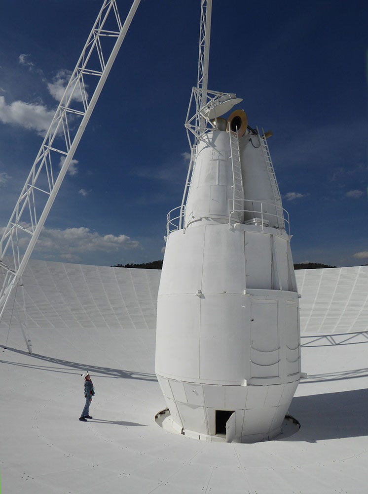 Glen standing on top of the Canberra DSN Station 43 dish