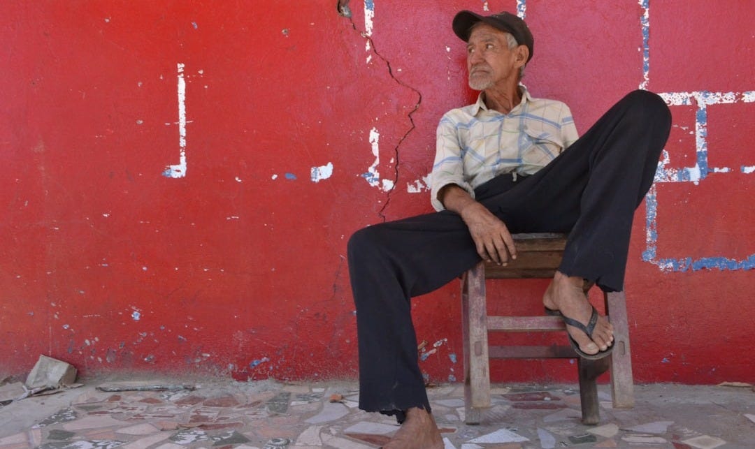 man sitting on chair
