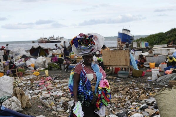 A clothes vendor stands in an outdoor market in Cap-Haitien, Haiti, Wednesday, April 17, 2024. (AP Photo/Ramon Espinosa) A clothes vendor stands in an outdoor market in Cap-Haitien, Haiti, Wednesday, April 17, 2024. (AP Photo/Ramon Espinosa)