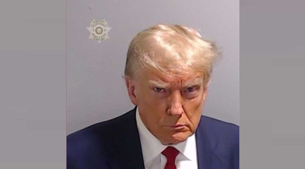 a mug shot of a former President Donald Trump taken at Fulton County jail in Atlanta, Georgia on August 24, 2023. a mug shot of a former President Donald Trump taken at Fulton County jail in Atlanta, Georgia on August 24, 2023.