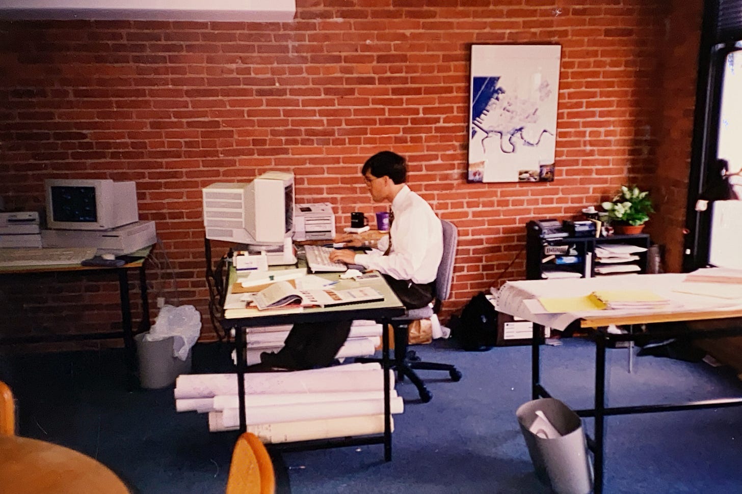 A person sitting at a desk

AI-generated content may be incorrect.