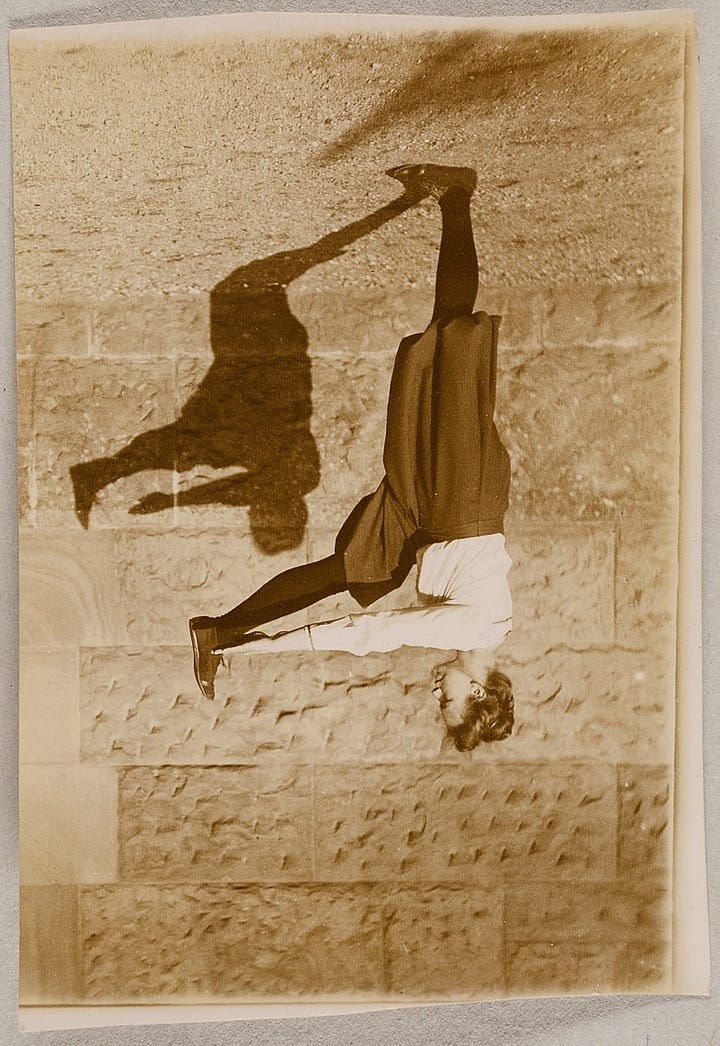 Woman standing on right leg with lift leg extended reaching for her foot