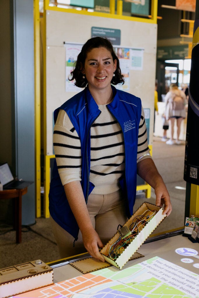 Linda Hirsch demonstrating a game at the Seymour Center