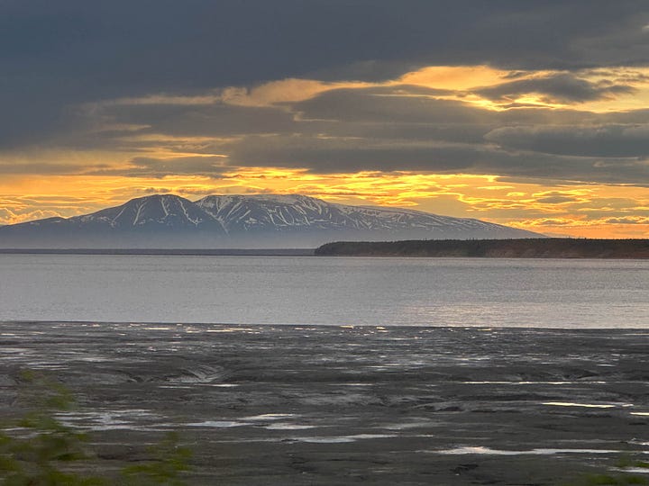 Two mountain scenes, one of the "sleeping lady" near Anchorage, Alaska.