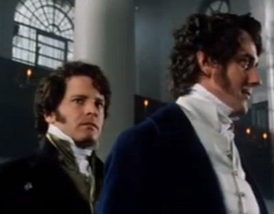 Mr. Darcy and Mr. Wickham standing at the alter. 