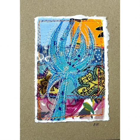 Fabric collage with stitched motif in contrasting colour