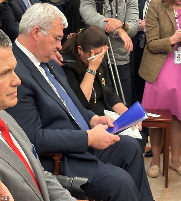 Oksana Markarova, pictured, the nation's ambassador to the United States held her hands as the two presidents erupted in a shouting match in the Oval Office in the White House .
