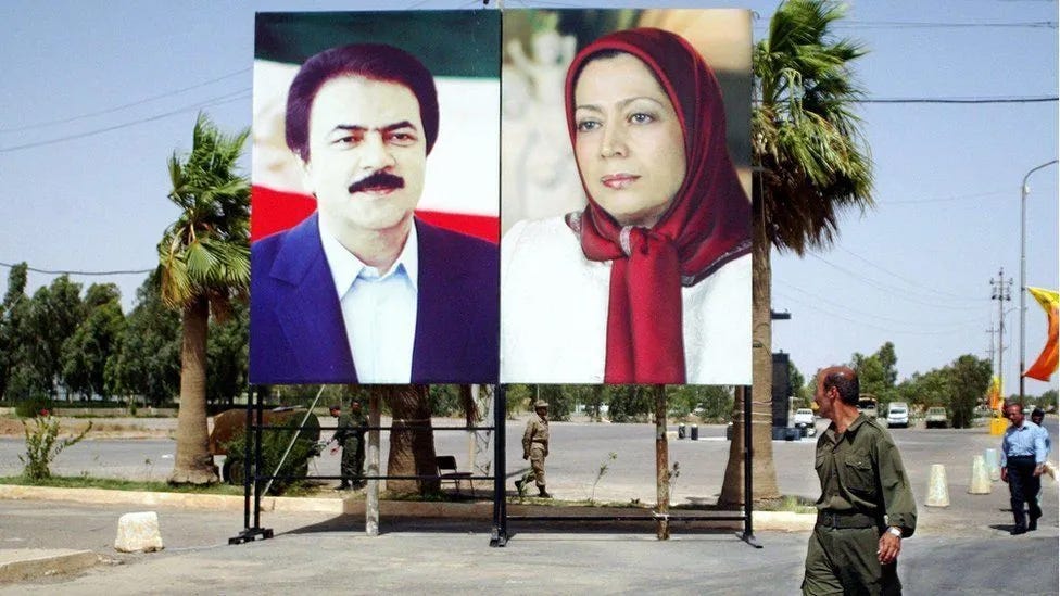 Maryam Rajavi, (r) the group's leader, is referred to as "Iran's president in exile" by followers Maryam Rajavi, (r) the group's leader, is referred to as "Iran's president in exile" by followers