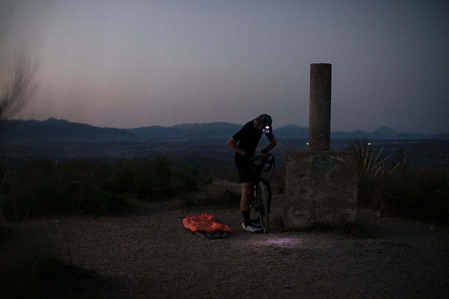 A rider prepares for the night at Badlands