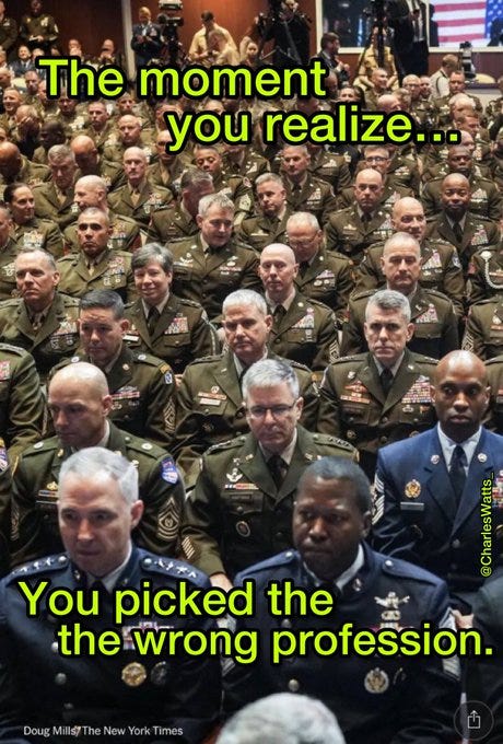 A large group of military personnel in uniform, seated in rows at a formal event. Many wear army and air force attire with visible medals and insignia. Text overlay reads "The moment you realize... You picked the wrong profession..." with a watermark from The New York Times. A large group of military personnel in uniform, seated in rows at a formal event. Many wear army and air force attire with visible medals and insignia. Text overlay reads "The moment you realize... You picked the wrong profession..." with a watermark from The New York Times.
