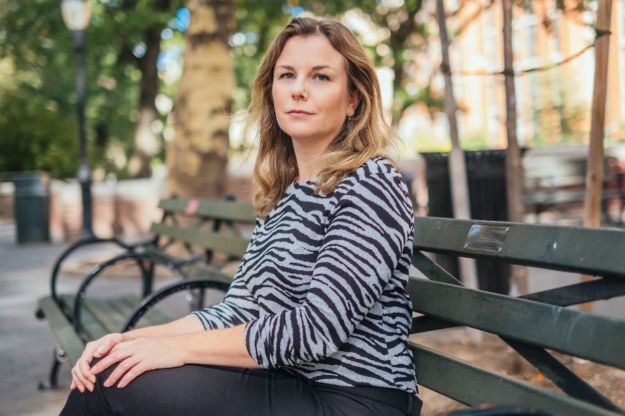 Me (Christie Smythe), sitting on a park bench in Harlem. Photo by Stephen Yang.
