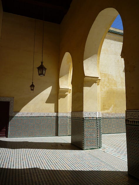 Three photos from Morocco: 1- Gold embossed design next to intricate bright tilework on a wall. 2- bright blue and white walls with an arched window painted with a yellow frame. 3- a gorgeous arched double doorway with light streaming through to shine on a detailed tile floor.