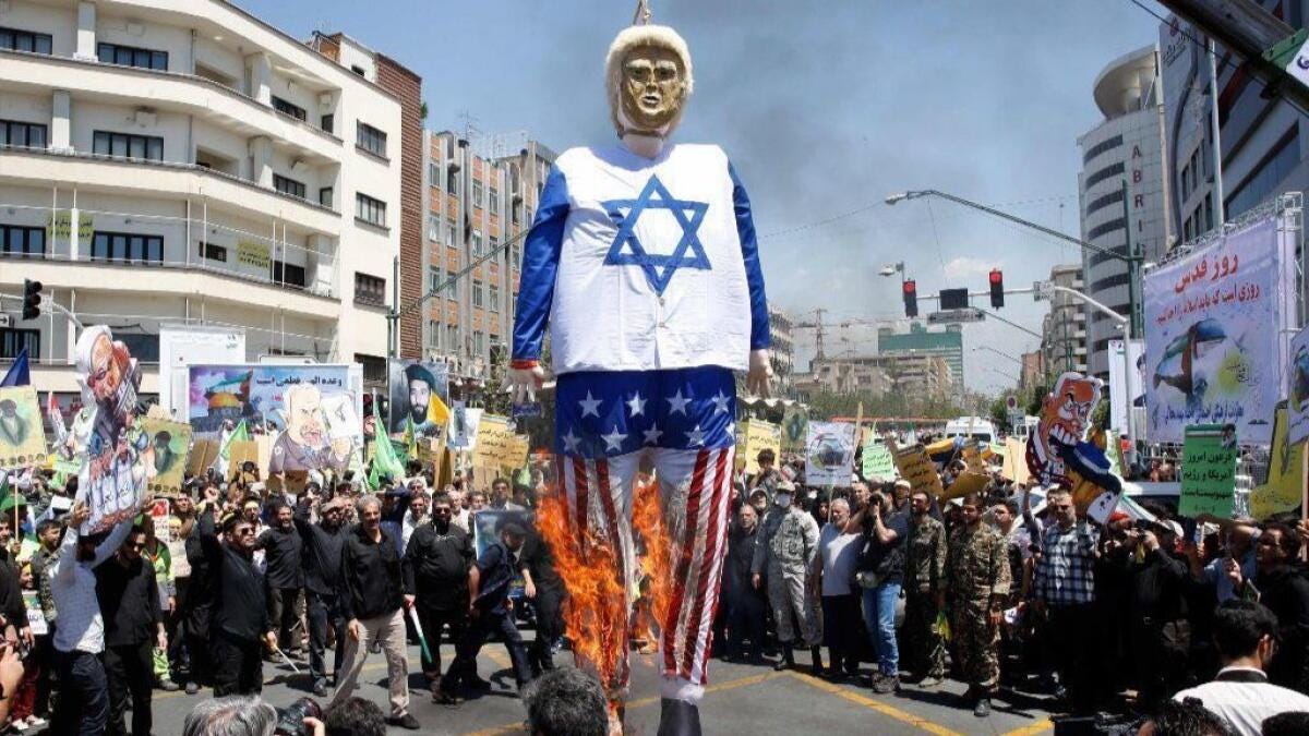 In 'Jerusalem Day' protest, Iranians burn effigy of President Trump dressed  in an Israeli flag - Los Angeles Times