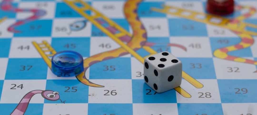 a close up of a board game with dices