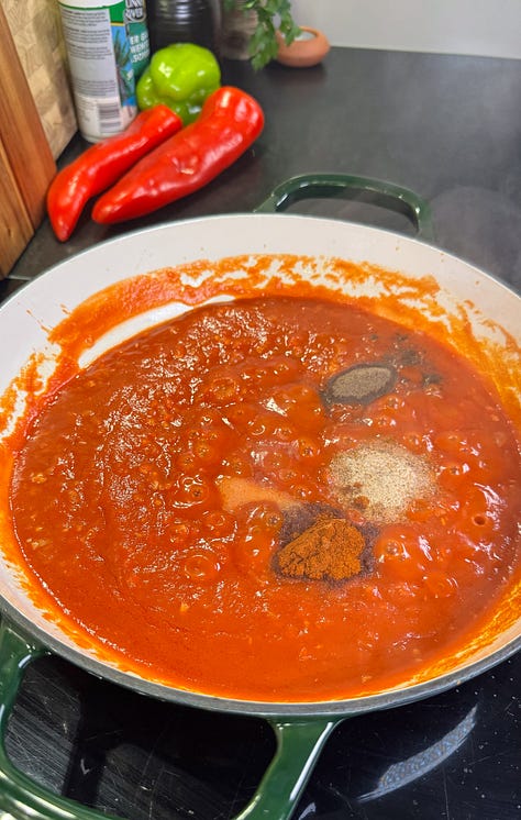 Photo 1: Overhead side shot of jerk chicken meatballs in a rich tomato sauce Photo 2: Tomato sauce cooking in a pan with teaspoonfuls of seasoning powder Photo 3: Two bowls of linguine pasta with the meatballs and tomato sauce with a small coating of grated parmesan cheese