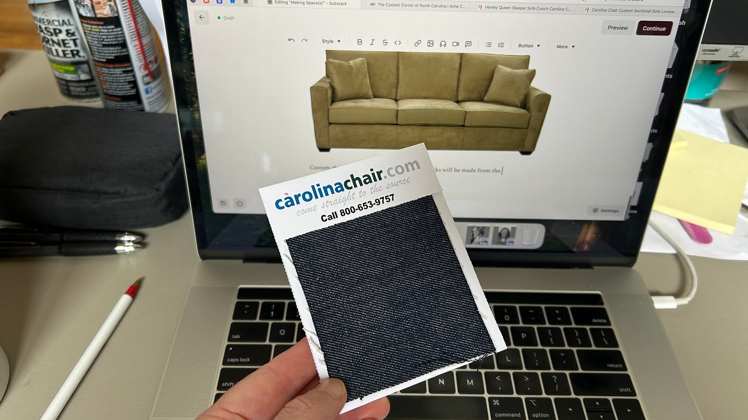 Hand holding a swatch of Garner Dark Blue Denim from Carolina Chair Company. This is the fabric that will be used on our Henley sleeper sofa. Hand holding a swatch of Garner Dark Blue Denim from Carolina Chair Company. This is the fabric that will be used on our Henley sleeper sofa.