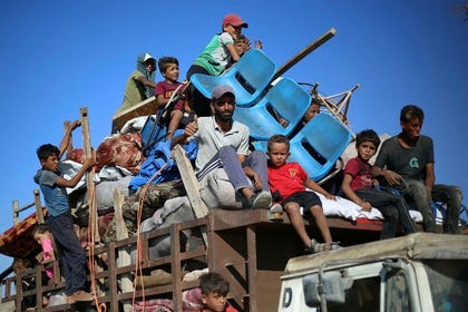 Residents leaving the Nuseirat refugee camp in central Gaza yesterday.