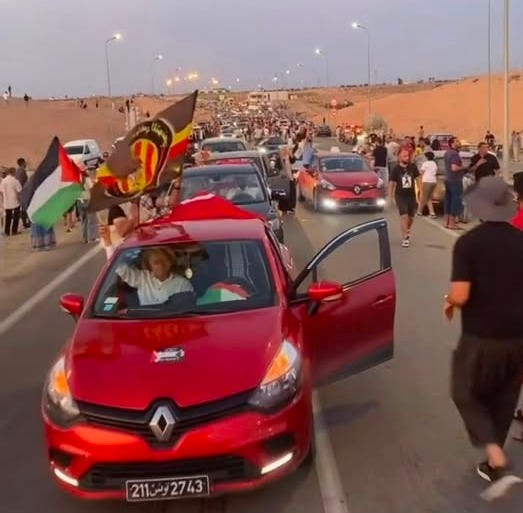 May be an image of 6 people, car and text