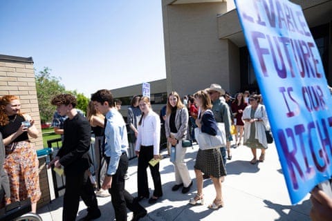Youth plaintiffs in the Held v Montana climate case leave the Montana Supreme Court in July 2024.