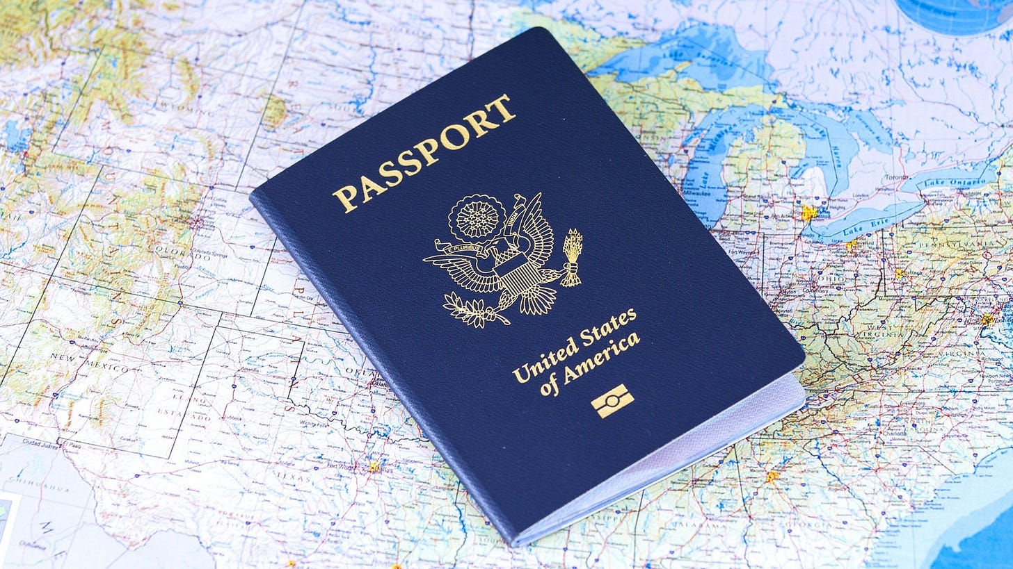 A United States passport sits on a map of the United States