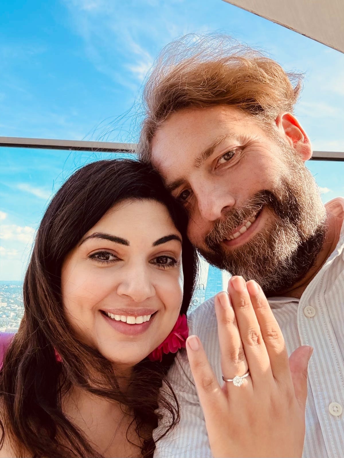 a happy couple who have just got engaged