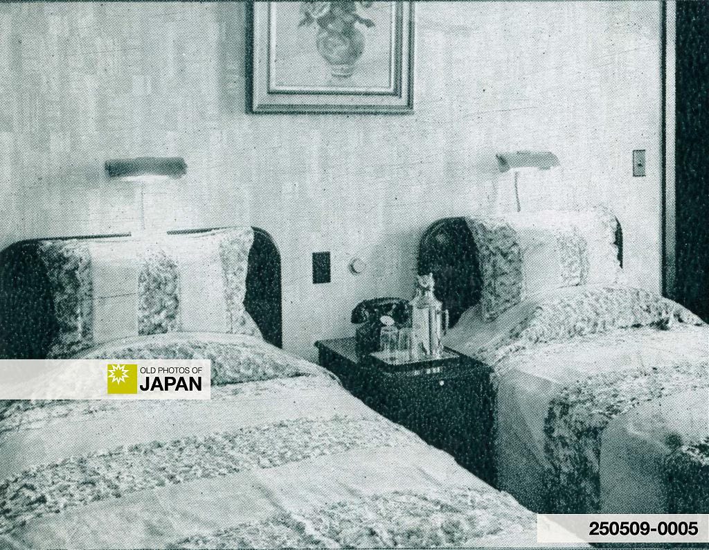 Overhead reading lamps in a New Osaka Hotel bedroom, ca. 1935
