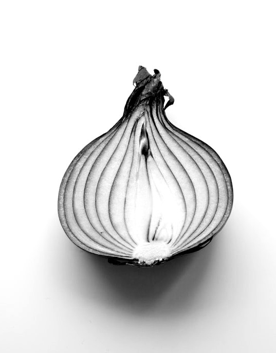 pink and white garlic on white surface pink and white garlic on white surface