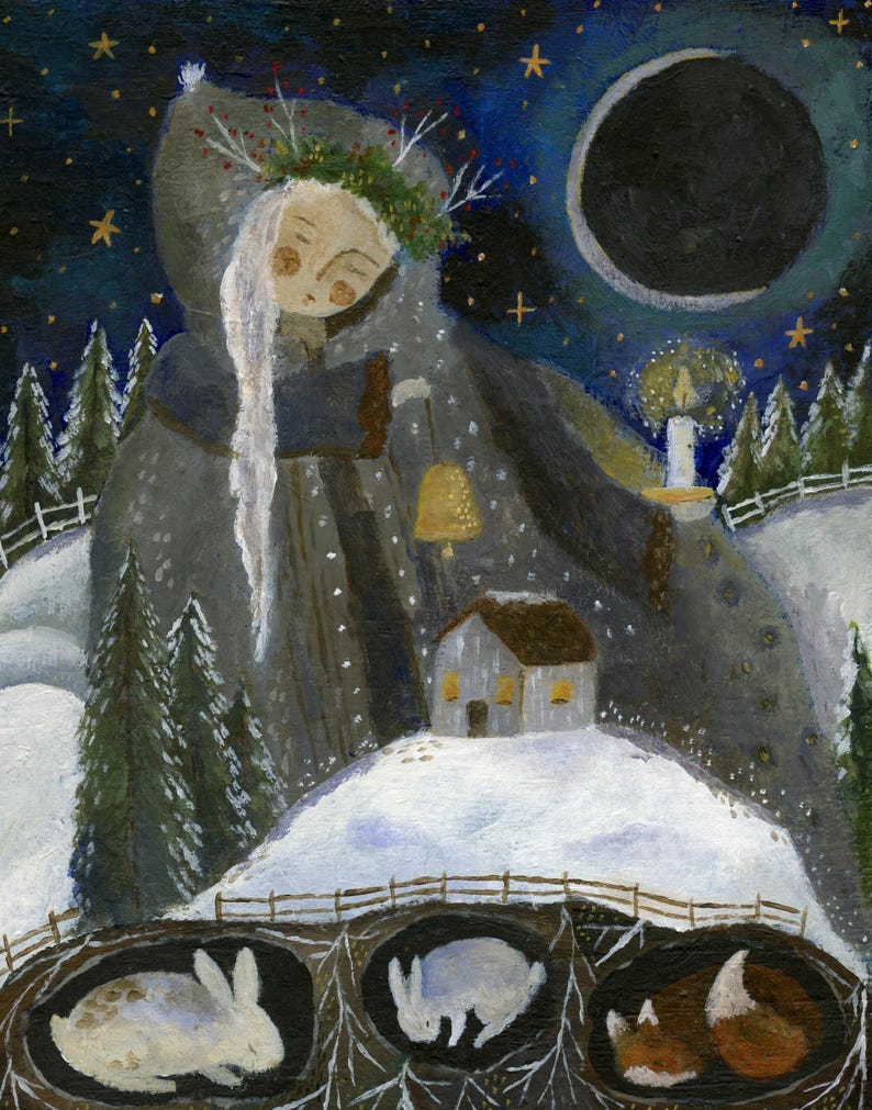 May include: A painting of a woman in a hooded cloak standing in a snowy landscape. The woman is holding a bell in her left hand and a candle in her right hand. There are stars in the sky and a crescent moon. There are three rabbits sleeping in burrows at the bottom of the painting. May include: A painting of a woman in a hooded cloak standing in a snowy landscape. The woman is holding a bell in her left hand and a candle in her right hand. There are stars in the sky and a crescent moon. There are three rabbits sleeping in burrows at the bottom of the painting.