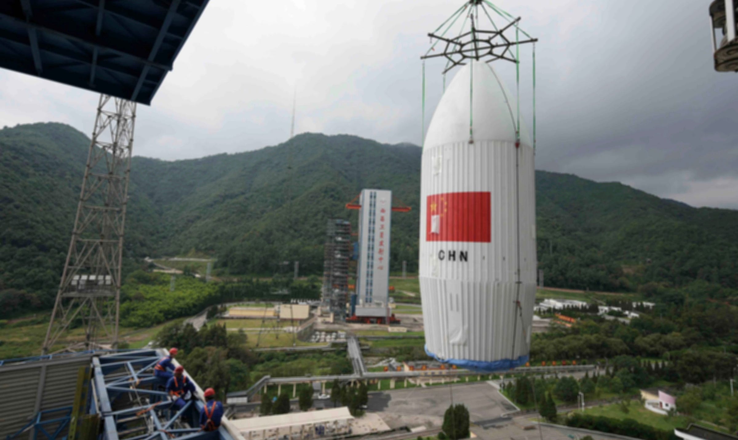 The fairing of the Long March 2D Y94 vehicle being lifted onto Launch Complex 3 ahead of its September 2025 launch. The fairing of the Long March 2D Y94 vehicle being lifted onto Launch Complex 3 ahead of its September 2025 launch.