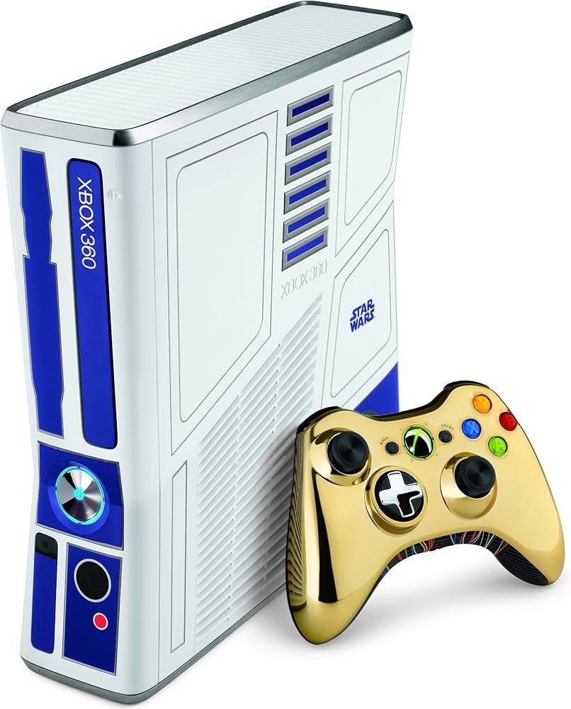 White and blue Xbox 360 console with Star Wars theme, featuring a gold controller. Console has "XBOX 360" and "STAR WARS" text.