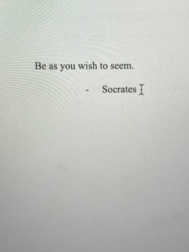 This may contain: the words be as you wish to seem soccrats i are written in black ink