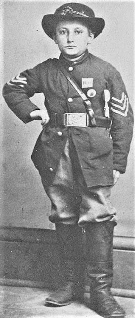 A person in a military uniform

Description automatically generated