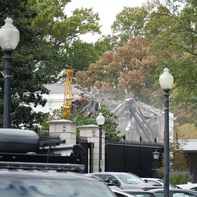 The grotesque metaphor of Trump tearing apart the figurative seat of American democracy