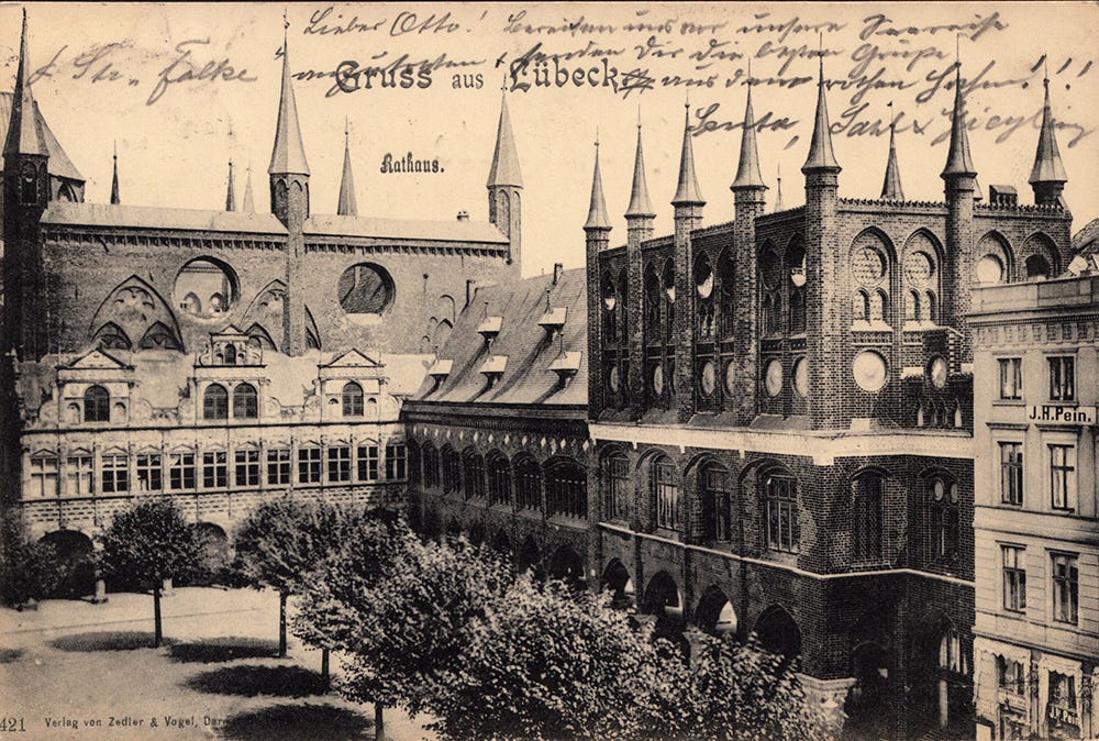 Sepia postcard with a photograph of Lübeck's townh hall