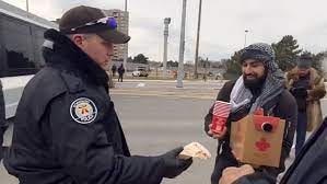 Video of cops with coffee at protest sparks outcry Video of cops with coffee at protest sparks outcry