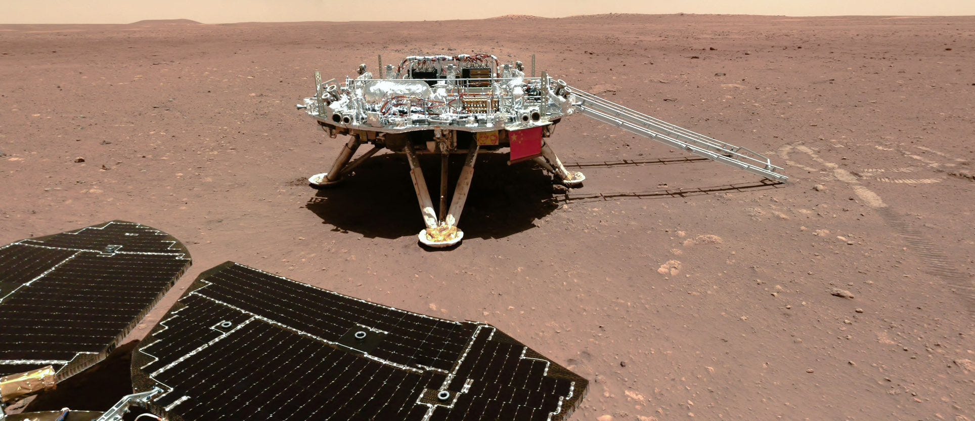 The Mars lander for the Tianwen-1 mission as seen by the Zhurong rover after it rolled onto the surface in May 2021.
